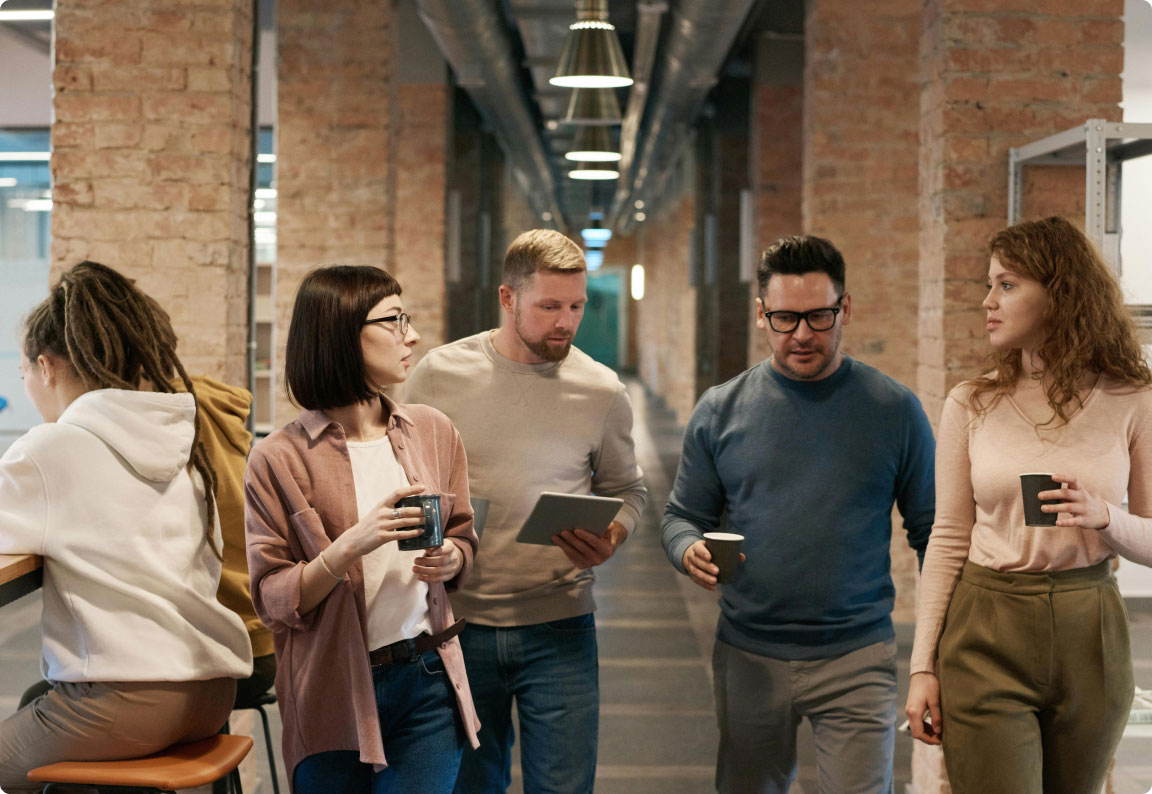 happy employees with health insurance benefits
